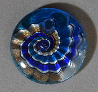 Round pendant bead from lampwork glass.