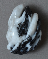 Zebra agate pendant bead carving of rabbit.