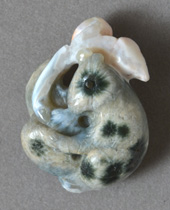 Carving of squirrel and bird from Madagascar ocean jasper.