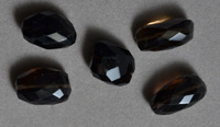 Faceted nugget beads from smoky quartz.