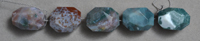 Faceted nugget beads from multi color Indian moss agate.