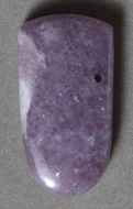 Shield shaped pendant bead from purple sugilite.
