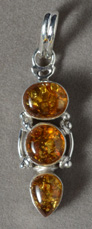 Baltic amber pendant with silver bale.
