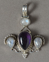 Amethyst and moonstone pendant with siver bale.