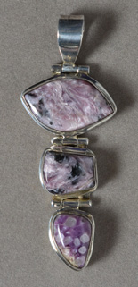 Russian charoite pendant with sterling silver bale.