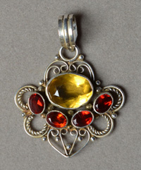 Citrine with silver gemstone pendant.