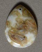 Flat drop shaped agate pendant bead.