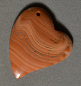 Red malachite freeform heart pendant.