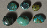 Assorted turquoise oval beads.