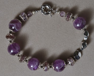Bracelet from amethyst round and rondelle beads.