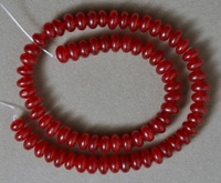 8 x 5 rondelle beads from ruby colored chalcedony.