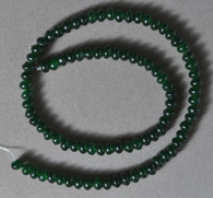6mm rondelle beads from green jade.