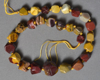 Mookaite freeform faceted nugget beads.