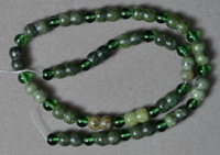 Peanut shape serpentine with 6mm round green glass beads.
