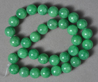 Green calcite 12mm round beads.