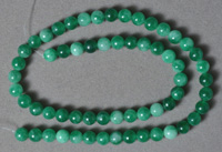 Imperial green jadeite 6mm round beads.