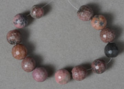Rhodonite 10mm faceted round beads
