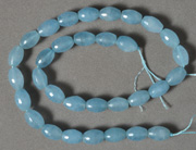Aquamarine faceted barrel bead strand.