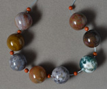 Multi color American agate round beads.