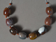 Large barrel beads from multi color agate.