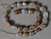 Mexican agate tumbled nugget bead strand.