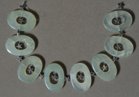 Green jade O shaped beads.