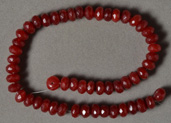 Ruby quartz faceted rondelle beads.