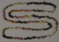Long strand of tourmaline chip beads.