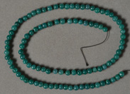 Emerald round beads from India.