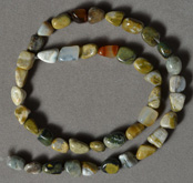 Multi color ocean jasper nugget beads.