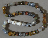 Vase shaped multi color agate beads.