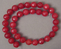 Larger faceted round beads from red ruby quartz.