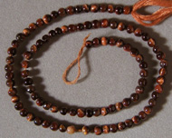 Small round beads from red tiger eye.