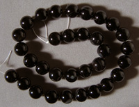 Large round beads from smoky agate.