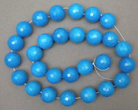 Large faceted round beads from blue jade.