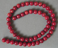 8mm round beads from dark red coral.