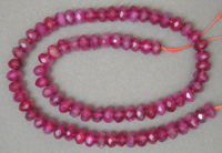 Strand of purple agate rondelle beads.