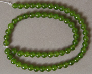 Smaller round beads from green jade.