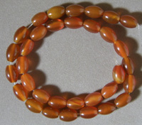 Oak barrel beads from red agate.