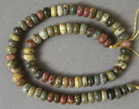 Rondelle beads from multi colored Picasso jasper.