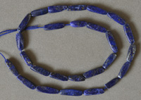 Twist beads from lapis lazuli with pyrite.