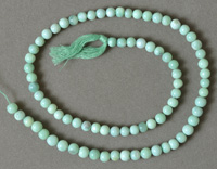 Round beads from seafoam green opal.