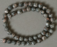 Round beads from crinoid fossil.