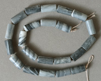 Gray, black and white drum beads from spiderweb Jasper.