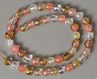 Faceted round beads from watermelon tourmaline.