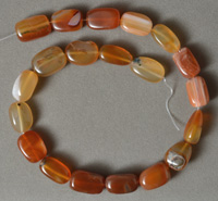 Natural carnelian tumbled nugget beads.