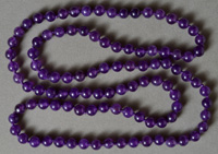 Long necklace from amethyst round beads.