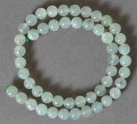 8mm round beads from green prehnite.