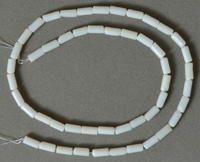 Tube beads from white colored coral.