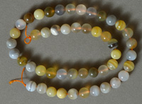 8mm round beads from grey, gold and white agate.